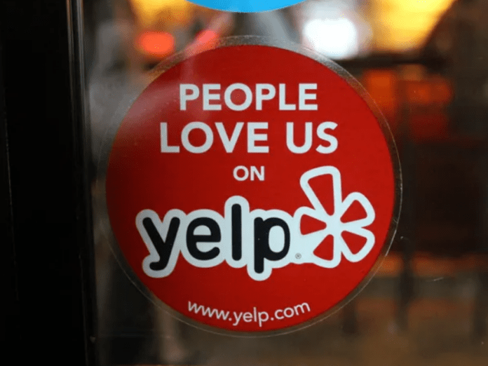 Эмблема Yelp