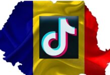 Логотип TikTok на фоне румынского флага