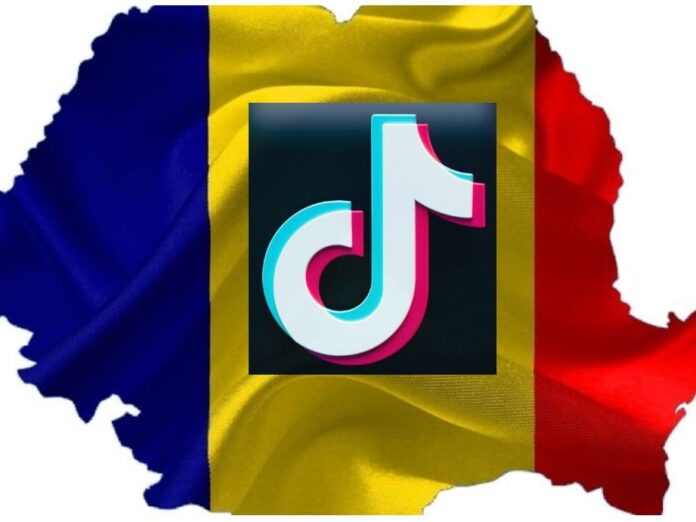 Логотип TikTok на фоне румынского флага